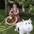 KidZZfarm: Играчка за скачане "Кравичката Бела" Каменно червено
